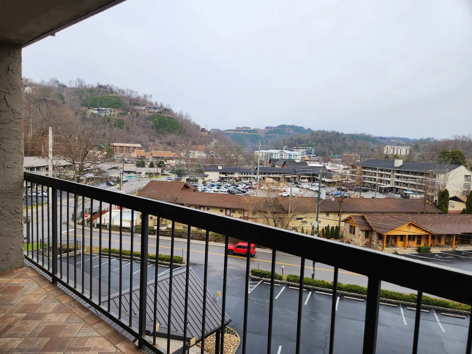 Expansive mountain vista from your private balcony overlooks the bustling valley below.