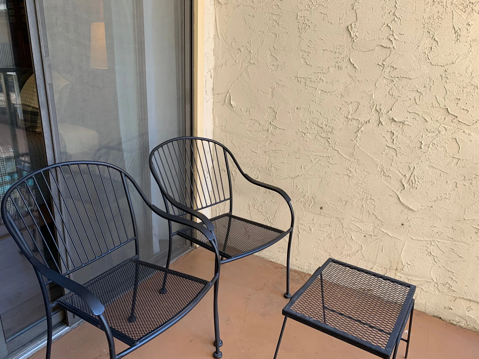 Step onto your private outdoor space and sink into comfortable seating perfect for morning coffee or evening relaxation.