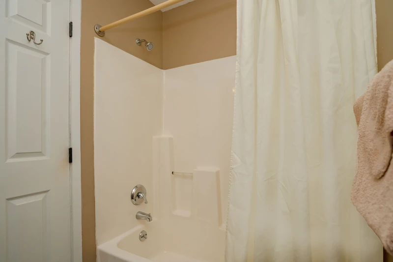 Rinse off after a day of adventure in your private tub and shower combo, complete with fresh towels for your comfort.