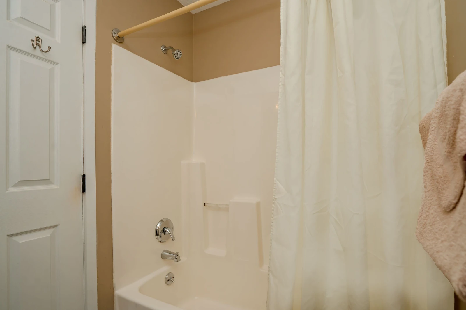 Rinse off after a day of adventure in your private tub and shower combo, complete with fresh towels for your comfort.