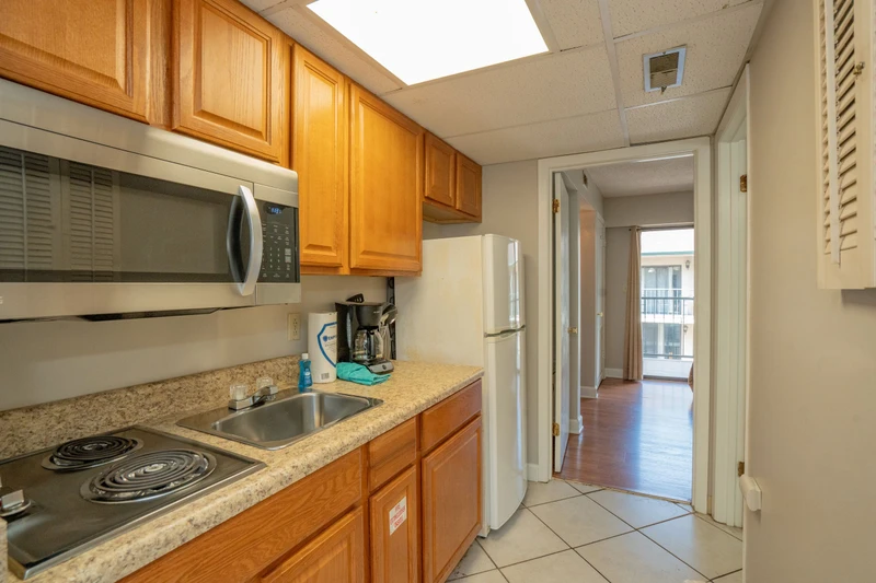 A bright, fully equipped kitchen awaits you with everything needed to prepare your favorite meals during your stay.