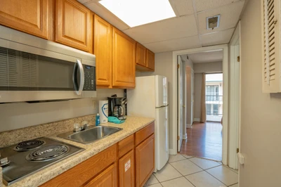 A bright, fully equipped kitchen awaits you with everything needed to prepare your favorite meals during your stay.