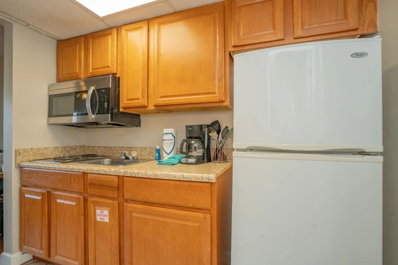 Your convenient kitchenette includes a refrigerator, microwave, and coffee maker—everything you need to feel right at home during your stay.