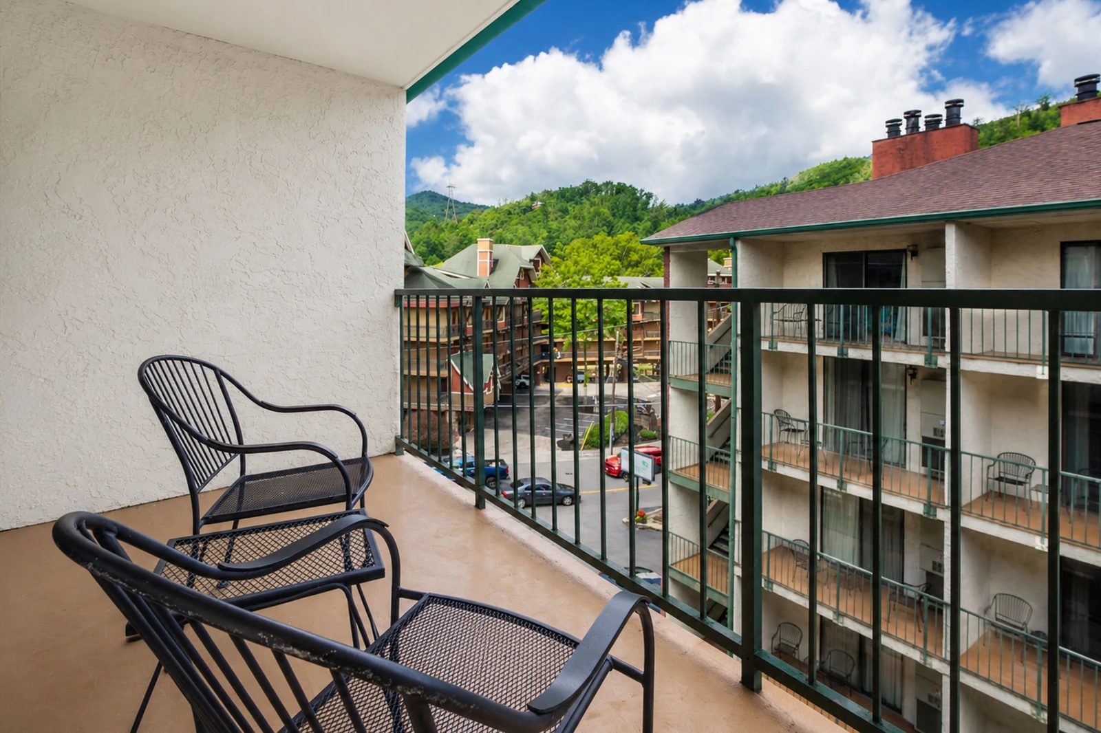 Step onto your private balcony and soak in the stunning mountain views. Enjoy morning coffee or evening relaxation in this peaceful outdoor retreat surrounded by lush greenery.