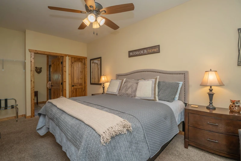 Settle into your cozy bedroom, where neutral tones and thoughtful touches create a peaceful retreat after a day of adventure.