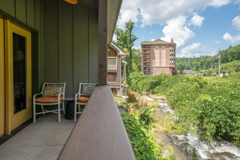 Step out onto your private balcony and breathe in the fresh mountain air while listening to the gentle rush of the stream below—a serene spot to sip your morning coffee and plan your day's adventures.