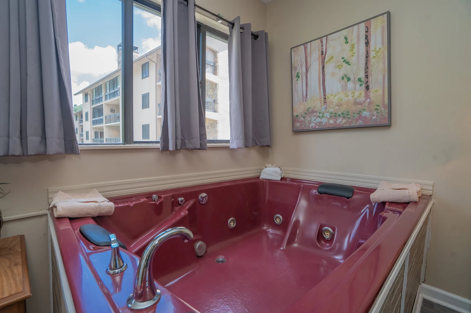Slip into your private jetted tub and let the warm, bubbling water melt away the day. With soft towels at hand and natural light streaming in, this is your personal sanctuary for relaxation.