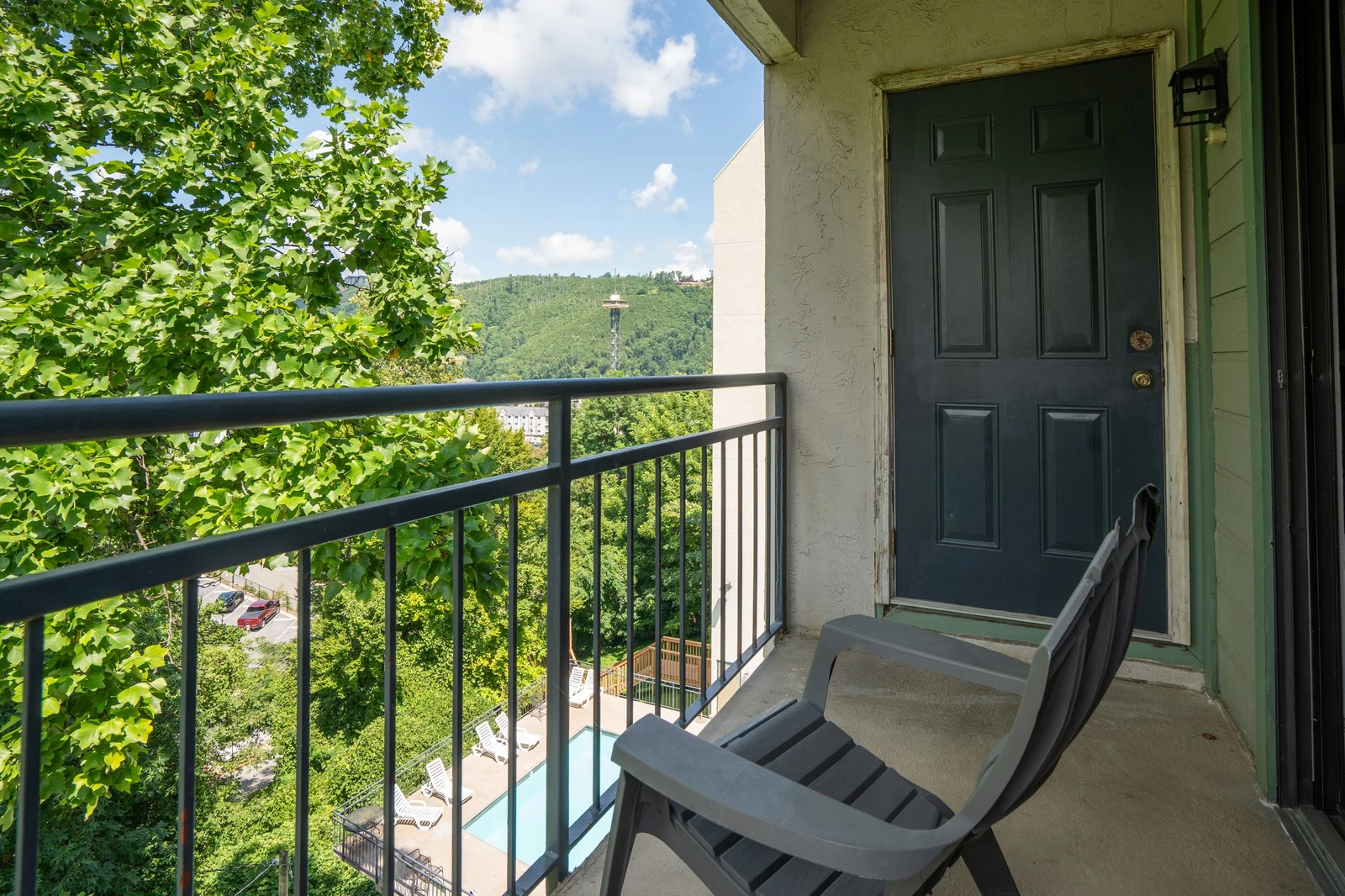 Step onto your private balcony and breathe in the fresh mountain air. Lush greenery frames stunning hillside views, offering a peaceful retreat where you can relax and unwind above it all.