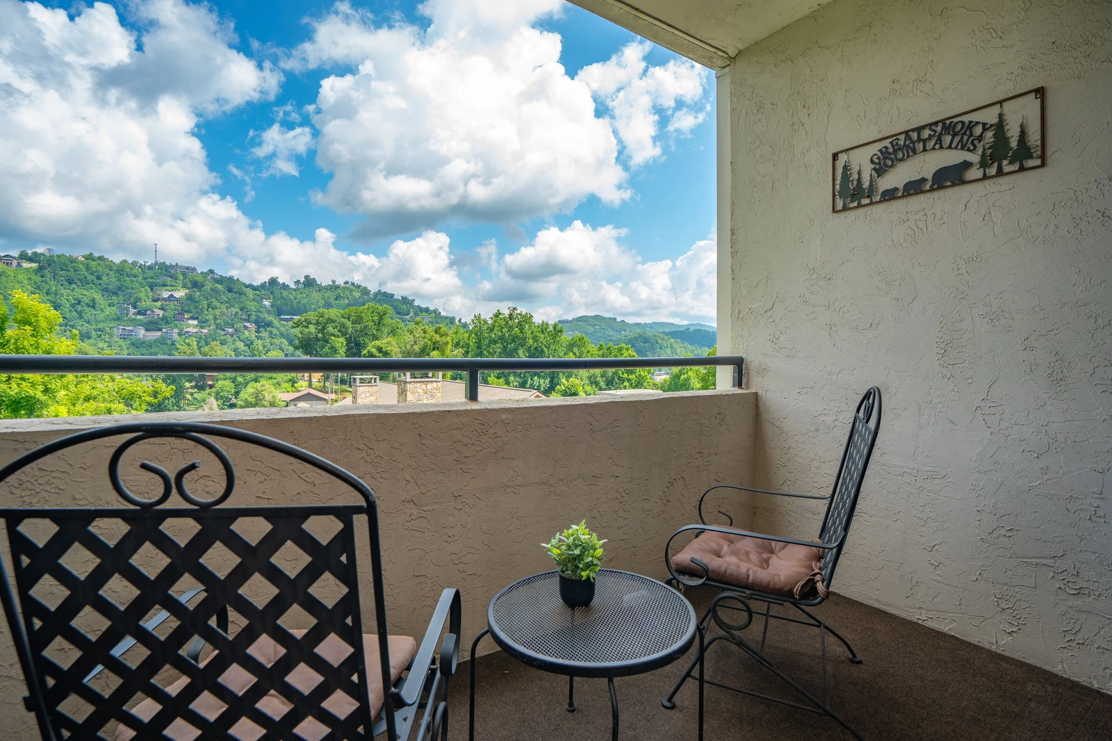 Step out onto your private balcony and breathe in the fresh mountain air. Enjoy morning coffee or evening relaxation with breathtaking views of the rolling Smoky Mountains.