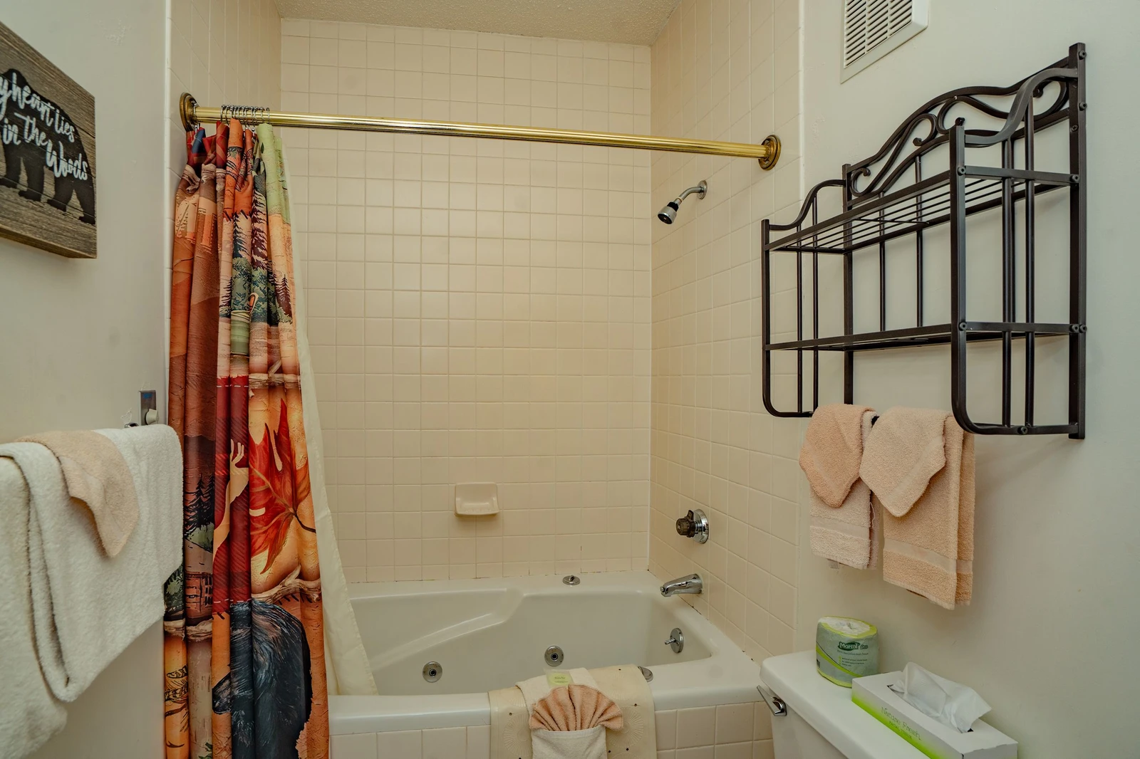 Freshen up in your private bathroom featuring a tub with jets for relaxation after a day of adventure. Fresh towels and essentials await your arrival.