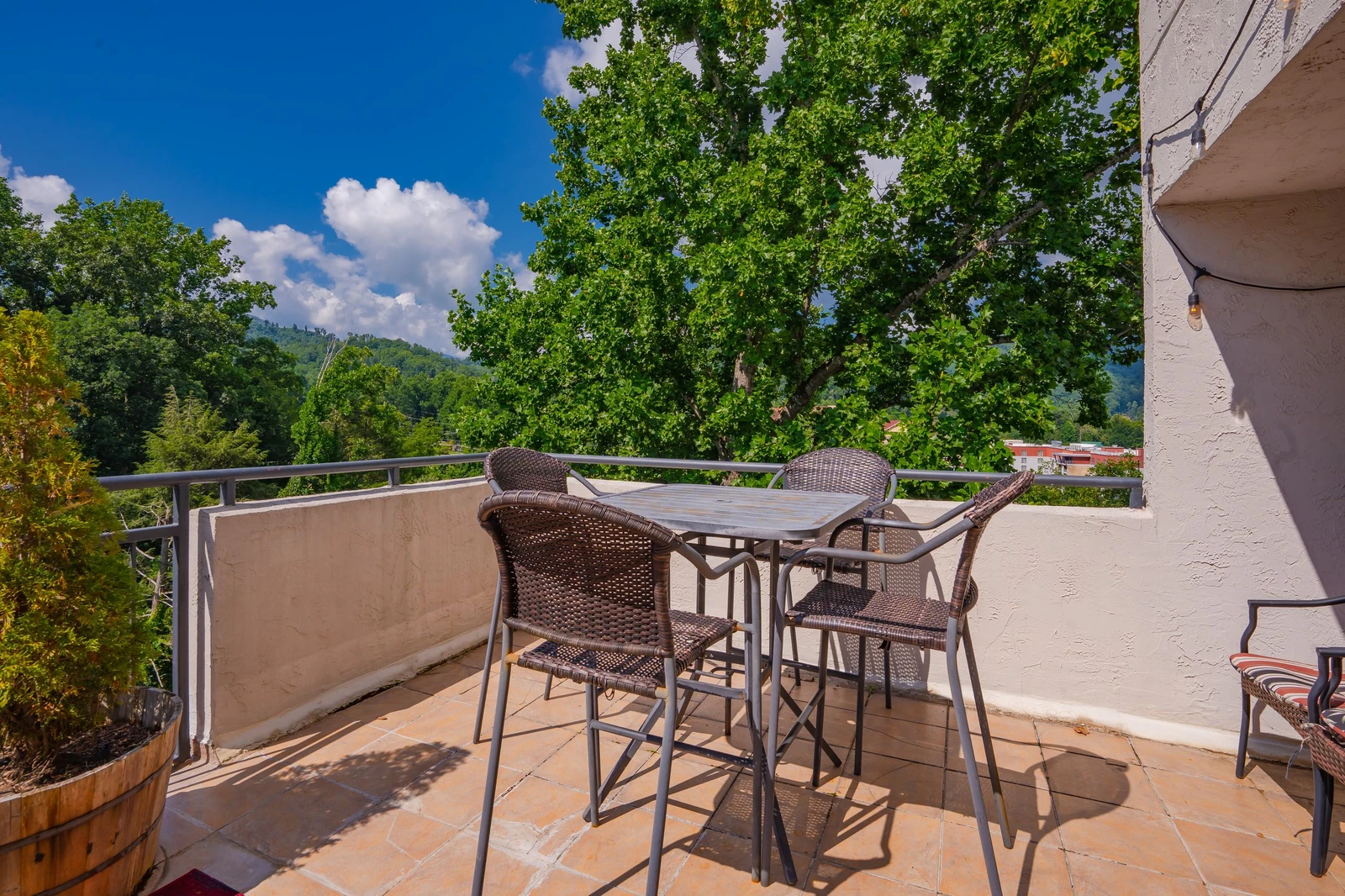 Step onto your private balcony and enjoy morning coffee surrounded by lush treetops and mountain views. A perfect spot to unwind with nature at your doorstep.