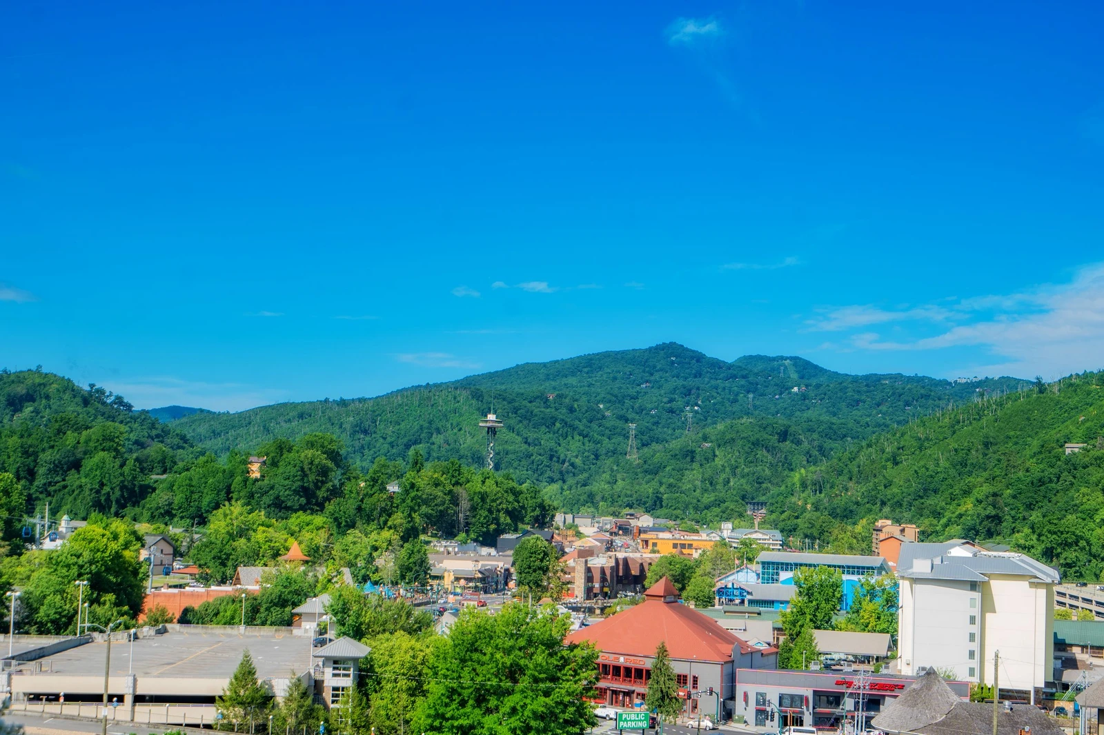 The property is nestled in a vibrant mountain town surrounded by forested peaks and local charm. This scenic area offers easy access to shops, dining, and outdoor adventures.