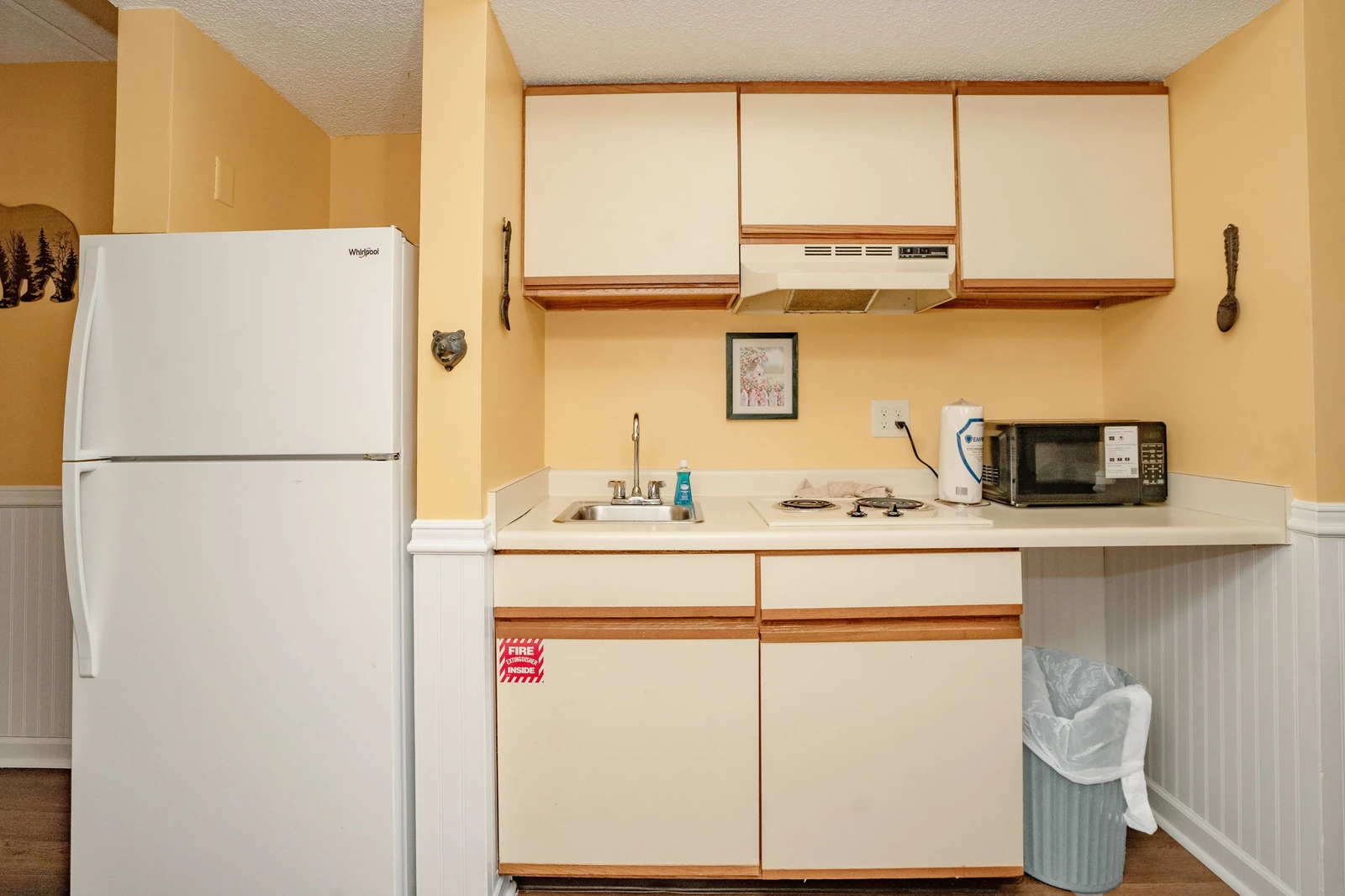 Your cozy kitchenette is fully equipped for easy meal prep, with a fridge, microwave, stove, and plenty of counter space to make yourself at home.