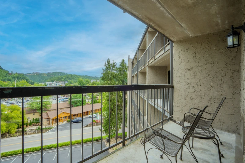 Settle into your private balcony with morning coffee and soak up the peaceful mountain scenery stretching beyond the valley below.