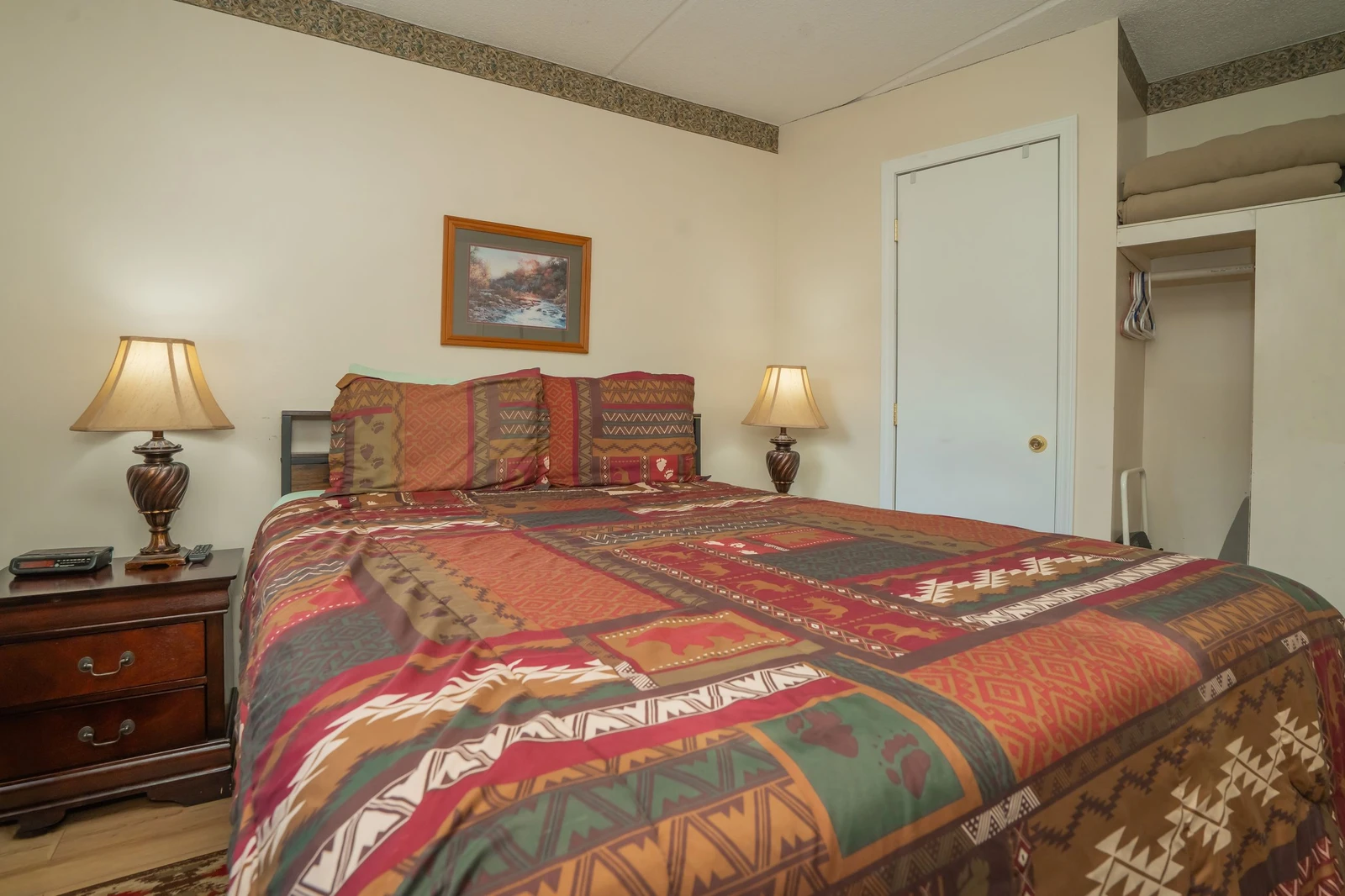 Your cozy bedroom retreat awaits, with soft bedside lamps casting a warm glow over plush linens and thoughtful touches that make you feel right at home.