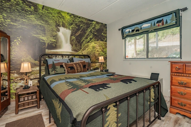 Your woodland retreat awaits in this cozy bedroom with rustic décor and nature-inspired touches that bring the forest indoors.