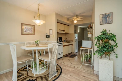 Your cozy dining nook opens into a well-equipped kitchenette, offering everything you need to prepare meals and gather for breakfast before exploring the area.