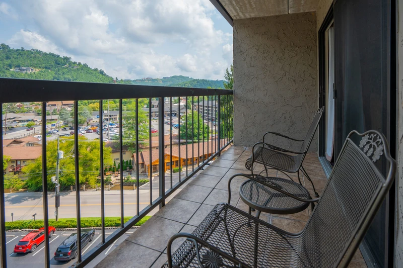 Step onto your private balcony and take in the stunning mountain and city views stretching before you. Settle into the comfortable seating with your morning coffee and watch the world wake up beneath the rolling green hills.