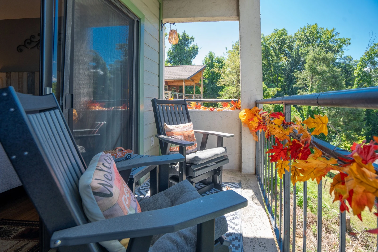 Step outside to your private balcony and breathe in the crisp autumn air while surrounded by vibrant fall foliage and peaceful tree views. Your morning coffee has never felt this serene.