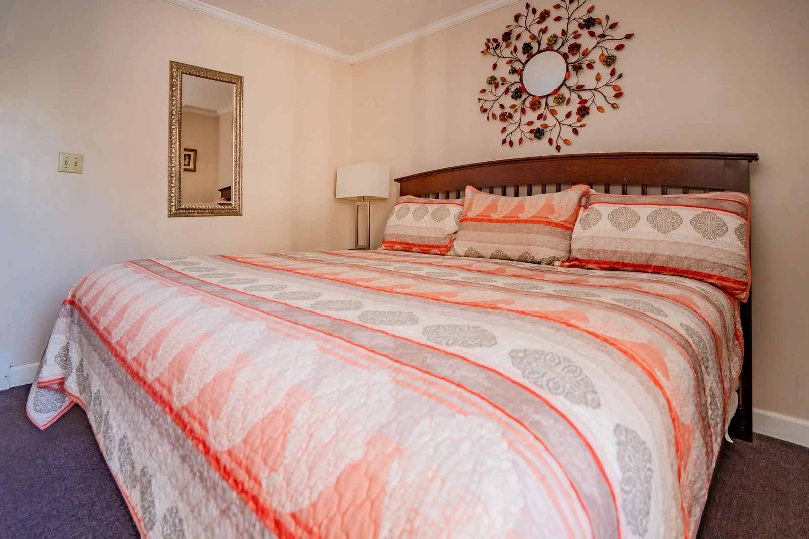 Sink into soft linens and let the warm tones wrap around you in this peaceful bedroom retreat—your perfect spot for a restful night's sleep.