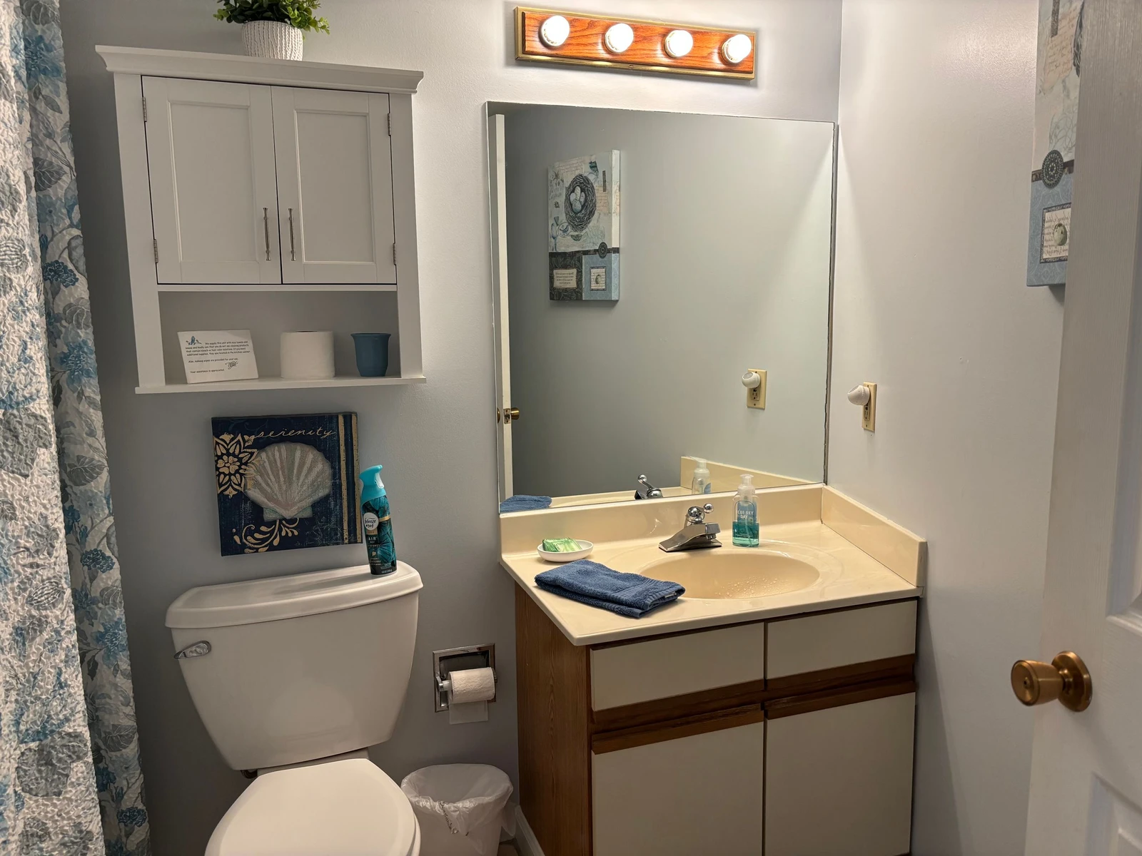 Freshen up in your private bathroom with a well-lit vanity, thoughtful storage, and coastal-inspired touches that make you feel right at home.
