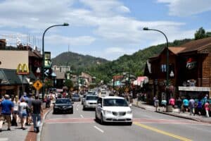 Visitors from all over the world walk along the streets of downtown Gatlinburg.