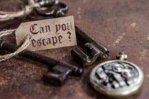 set of keys with message of can you escape 